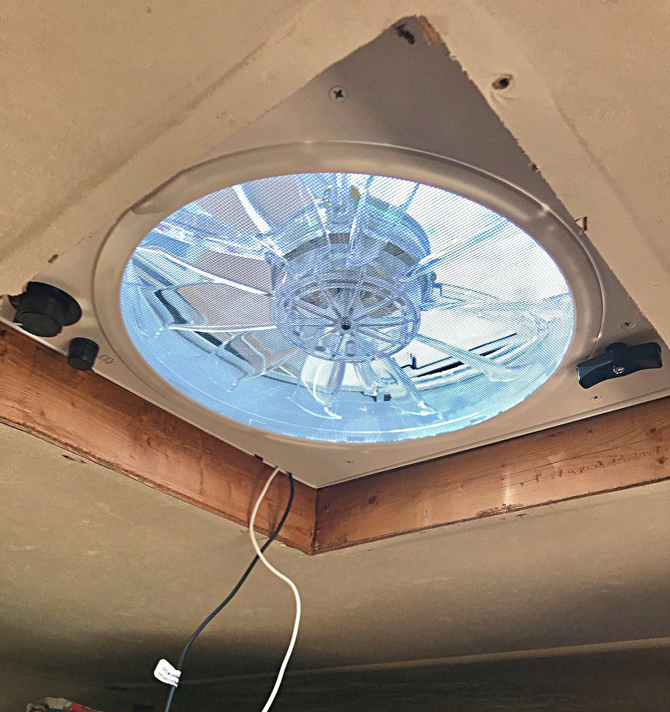 The Fantastic Vent Fan, seated and fastened, but not yet wired, looks so much better in the ceiling.